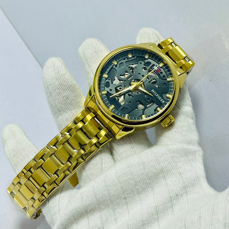 Luxury Skeleton Gold Automatic Watch for Men – Tommy-Inspired Design with Black Dial & Exposed Movement – Gold Stainless Steel Band