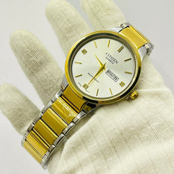 Citizen Quartz Men’al with Gold Accents, Day & Date Display, Diamond Hour Markers, Stainless Steel Bracelet – Water Resistant, Japan Movements Two-Tone Watch – Silver Di